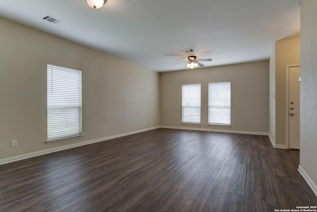 3622 Mill Mdw, San Antonio, TX 78247 - unfurnished room featuring a ceiling fan, dark wood-style floors, and baseboards