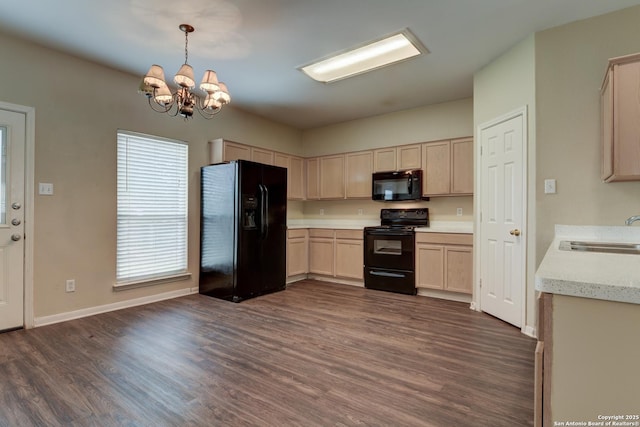 3622 Mill Mdw, San Antonio, TX 78247 - kitchen featuring black appliances, a sink, light brown cabinetry, light countertops, and a chandelier
