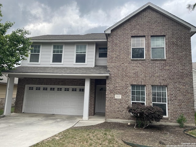 3622 Mill Mdw, San Antonio, TX 78247 - view of front facade with driveway, a garage, and brick siding