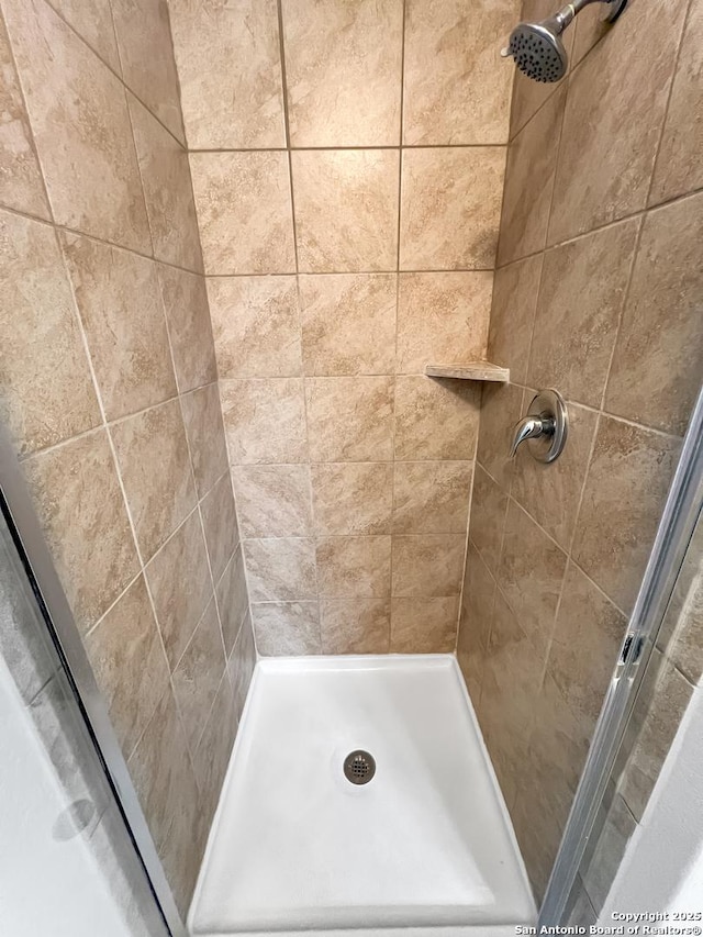 full bath featuring a stall shower