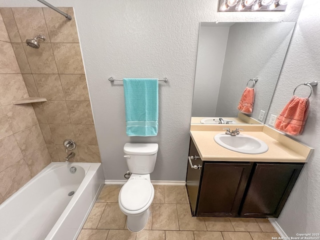 full bath featuring shower / bath combination, tile patterned flooring, vanity, baseboards, and toilet