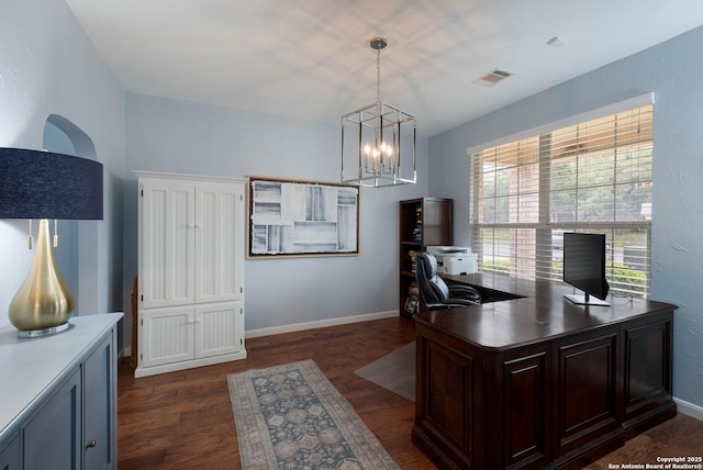 office featuring an inviting chandelier, baseboards, dark wood finished floors, and visible vents