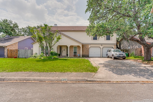 view of front of house with fence, a front lawn, brick siding, a garage, and driveway