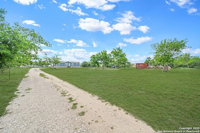 769 Kristen Ln, Harper, TX 78631 - exterior space with a yard, a rural view, and gravel driveway