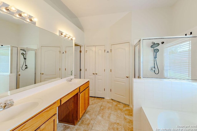 26923 Trinity Hts, San Antonio, TX 78261 - bathroom with a garden tub, a sink, tile patterned floors, and a shower stall
