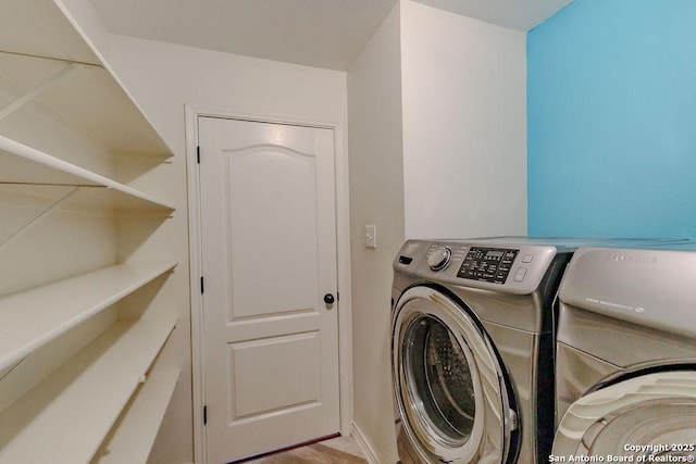 26923 Trinity Hts, San Antonio, TX 78261 - laundry room featuring laundry area and washer and clothes dryer