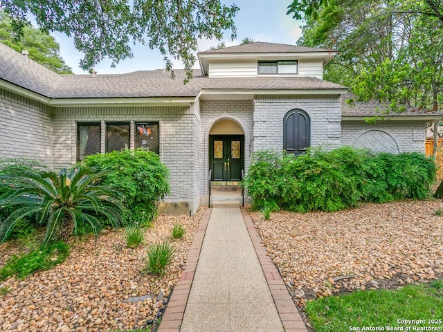 13907 Bluffmont, San Antonio, TX 78216 - view of front facade with brick siding and roof with shingles