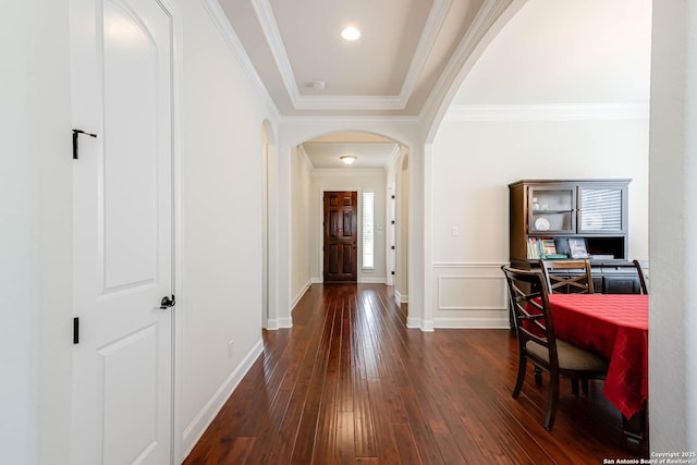 2623 Galit Cv, San Antonio, TX 78230 - corridor with crown molding, arched walkways, baseboards, and hardwood / wood-style floors