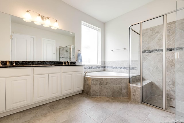2623 Galit Cv, San Antonio, TX 78230 - bathroom with tile patterned flooring, a shower stall, a garden tub, and vanity