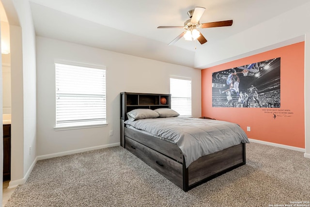 2623 Galit Cv, San Antonio, TX 78230 - bedroom with baseboards, ceiling fan, arched walkways, and light colored carpet