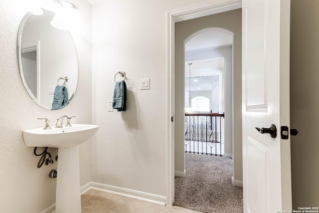 2623 Galit Cv, San Antonio, TX 78230 - bathroom featuring a sink and baseboards