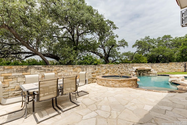 2623 Galit Cv, San Antonio, TX 78230 - view of patio / terrace featuring an in ground hot tub, a fenced in pool, and outdoor dining space