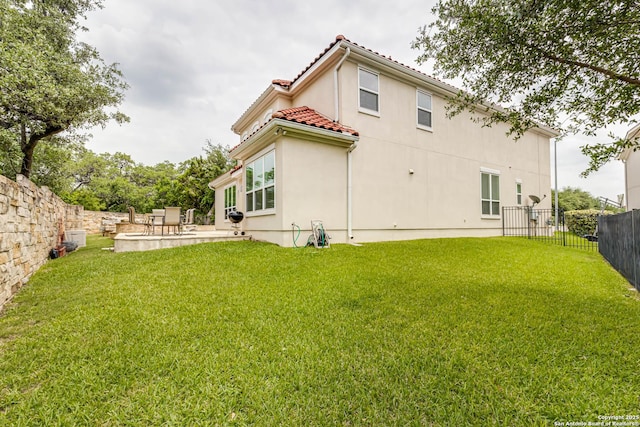 2623 Galit Cv, San Antonio, TX 78230 - back of property featuring a fenced backyard, a patio, stucco siding, and a yard