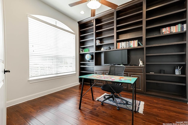 2623 Galit Cv, San Antonio, TX 78230 - office with baseboards, a ceiling fan, dark wood-style flooring, and a wealth of natural light