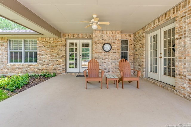 view of patio / terrace with ceiling fan and french doors