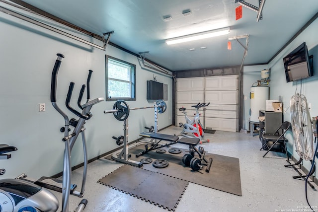 workout area with a garage and water heater