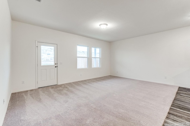5014 Jovian, San Antonio, TX 78245 - spare room featuring baseboards