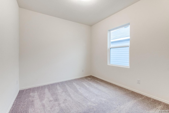 5014 Jovian, San Antonio, TX 78245 - unfurnished room with carpet floors and baseboards