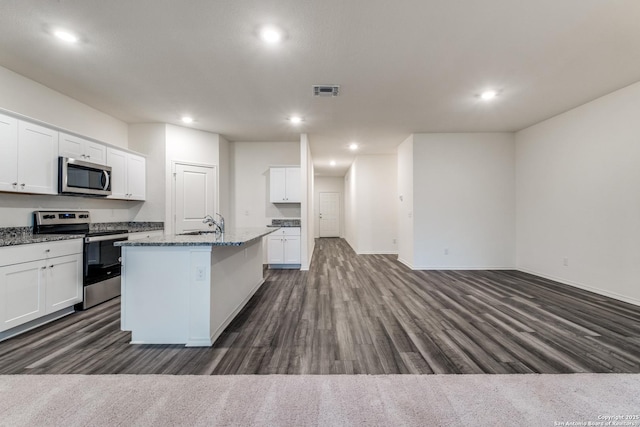 5014 Jovian, San Antonio, TX 78245 - kitchen featuring stainless steel appliances, baseboards, and dark wood-type flooring