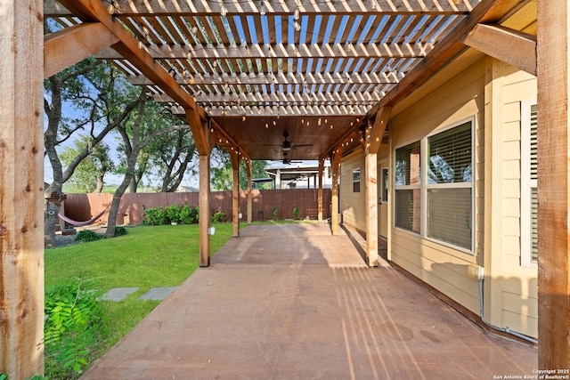 view of patio featuring a pergola, ceiling fan, and a fenced backyard