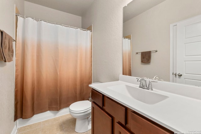 205 Wickersham, Boerne, TX 78015 - bathroom featuring toilet, tile patterned flooring, and vanity