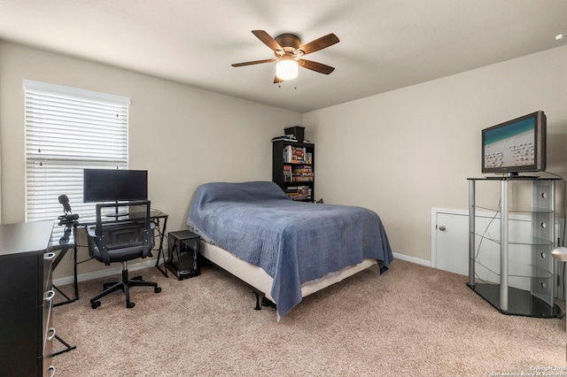 205 Wickersham, Boerne, TX 78015 - bedroom with baseboards, ceiling fan, and light carpet
