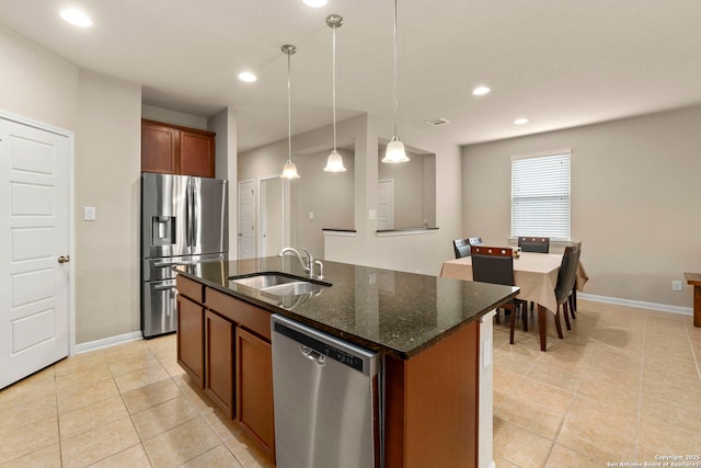 205 Wickersham, Boerne, TX 78015 - kitchen with baseboards, recessed lighting, a sink, appliances with stainless steel finishes, and light tile patterned floors