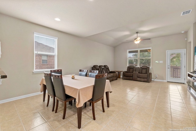 205 Wickersham, Boerne, TX 78015 - dining space featuring baseboards, lofted ceiling, light tile patterned flooring, and visible vents