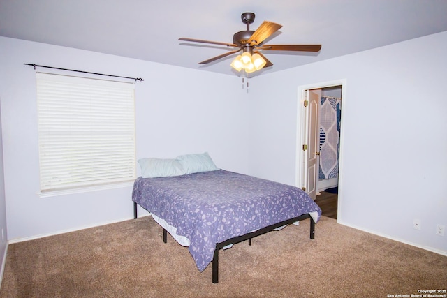 5315 Argyle, San Antonio, TX 78247 - carpeted bedroom with baseboards, a walk in closet, and ceiling fan