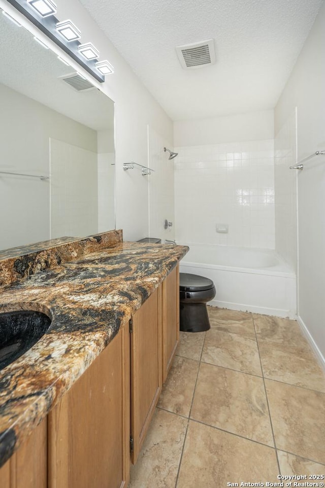 full bathroom featuring vanity, toilet, tile patterned floors, bathing tub / shower combination, and visible vents