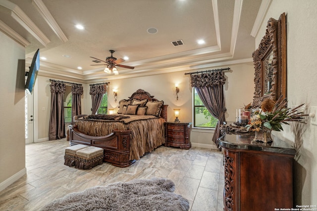 bedroom featuring visible vents, crown molding, baseboards, recessed lighting, and a tray ceiling