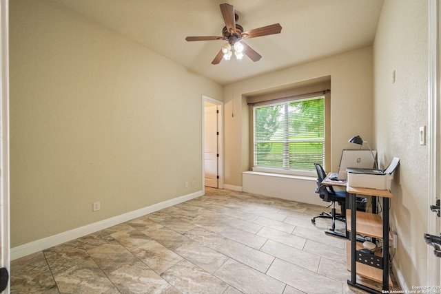 home office featuring baseboards and ceiling fan