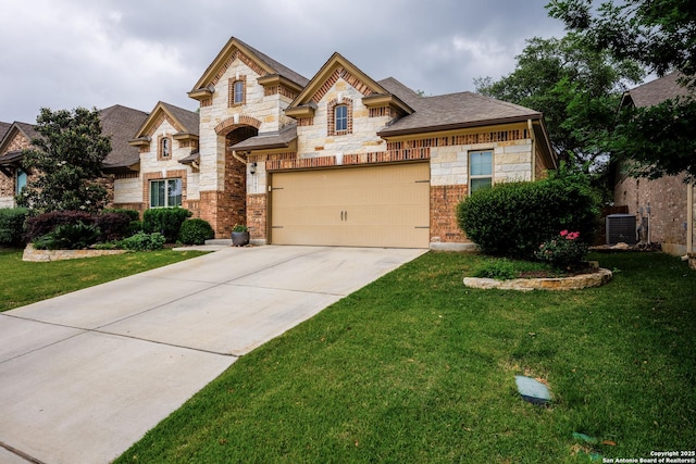 french country inspired facade with stone siding, central AC, driveway, and a front yard