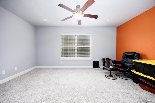 living area featuring baseboards, a ceiling fan, carpet flooring, and recessed lighting