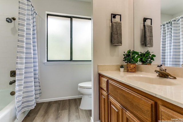 19750 Encino Way, San Antonio, TX 78259 - bathroom featuring vanity, toilet, wood finished floors, and shower / bath combo
