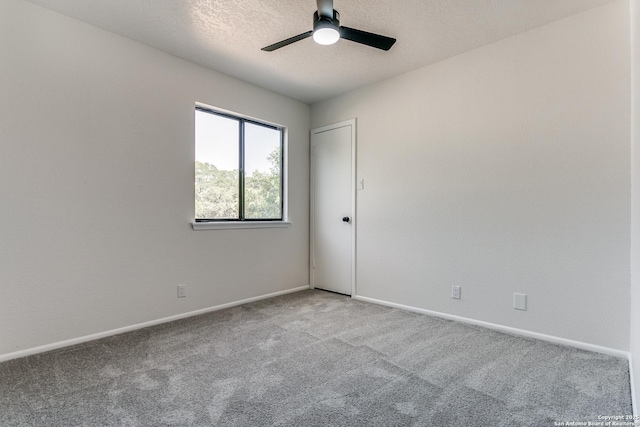 19750 Encino Way, San Antonio, TX 78259 - spare room featuring a ceiling fan, carpet, baseboards, and a textured ceiling