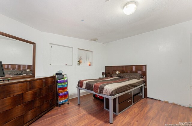 1109 Essex, San Antonio, TX 78210 - bedroom with wood finished floors