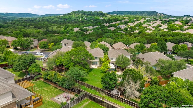 drone / aerial view with a mountain view and a residential view