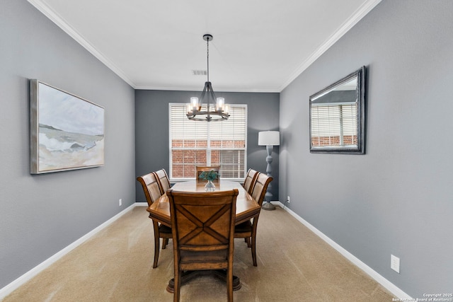 dining area with crown molding, light colored carpet, baseboards, and an inviting chandelier