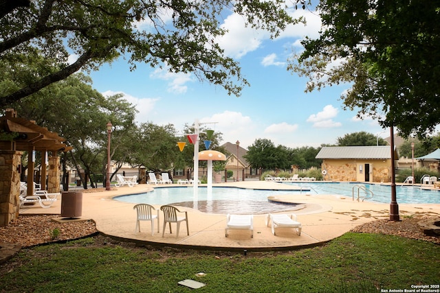 community pool with fence and a patio