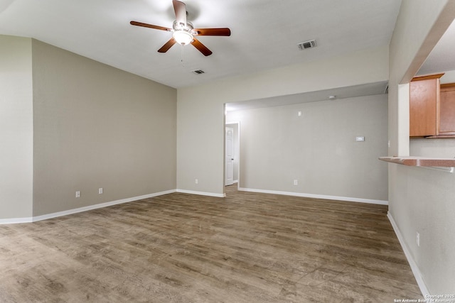 5735 Cardinal Fls, San Antonio, TX 78239 - interior space with ceiling fan, visible vents, baseboards, and wood finished floors