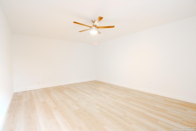 4742 Misty Run, San Antonio, TX 78217 - spare room with light wood-style floors, a ceiling fan, and baseboards