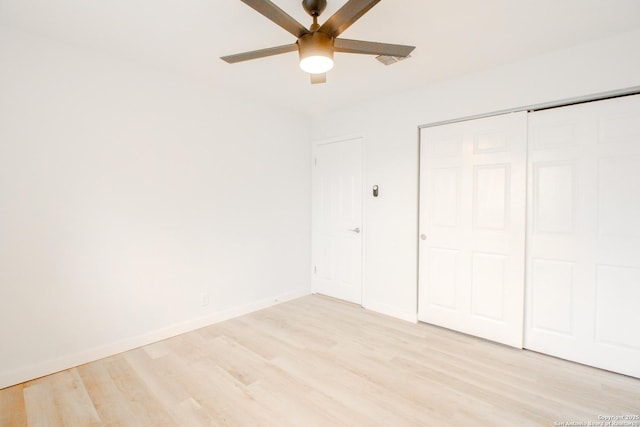 4742 Misty Run, San Antonio, TX 78217 - unfurnished bedroom featuring baseboards, ceiling fan, a closet, and light wood-type flooring