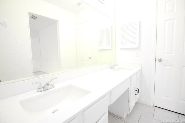 4742 Misty Run, San Antonio, TX 78217 - bathroom featuring double vanity, tile patterned floors, visible vents, and a sink