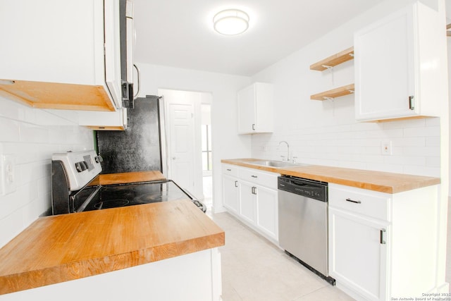 4742 Misty Run, San Antonio, TX 78217 - kitchen featuring open shelves, butcher block counters, tasteful backsplash, a sink, and stainless steel appliances