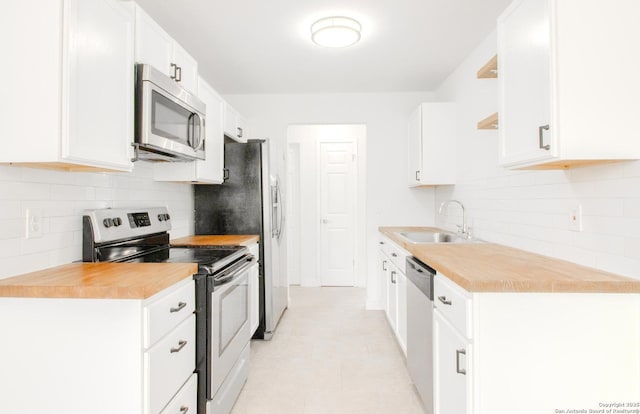 4742 Misty Run, San Antonio, TX 78217 - kitchen with backsplash, stainless steel appliances, open shelves, and a sink