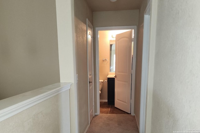 hallway with carpet