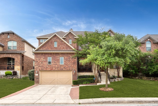 view of front of home with brick siding, a garage, driveway, and a front lawn