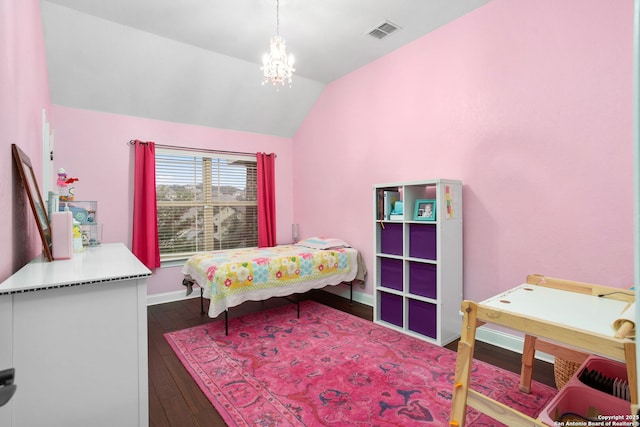 bedroom with an inviting chandelier, hardwood / wood-style floors, baseboards, lofted ceiling, and visible vents