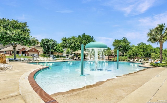 community pool with a patio